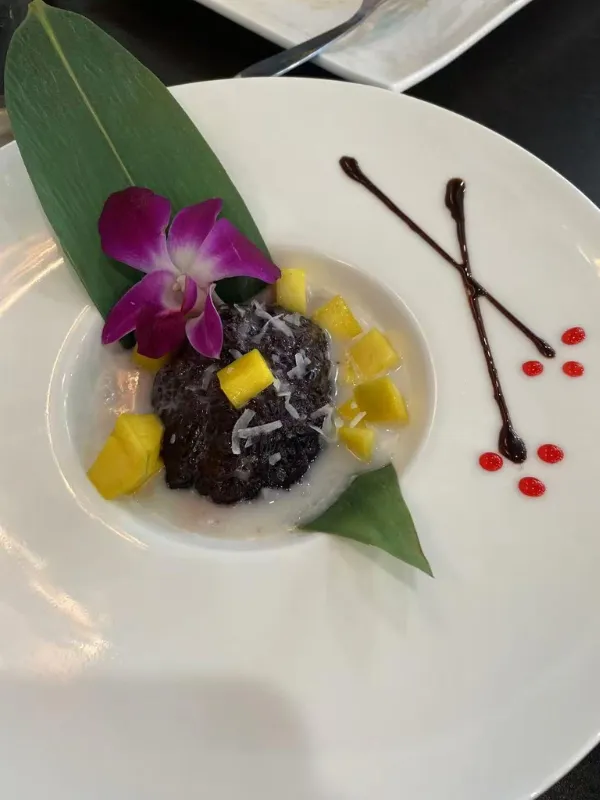 Black sticky rice mango coconut dessert at Mirai Sushi & Thai, a Sushi Restaurant in Lucie