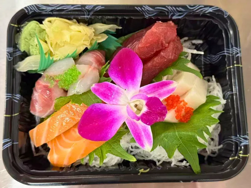 Mixed fresh sashimi takeout box set at Mirai Sushi & Thai, a Sushi Restaurant in Lucie